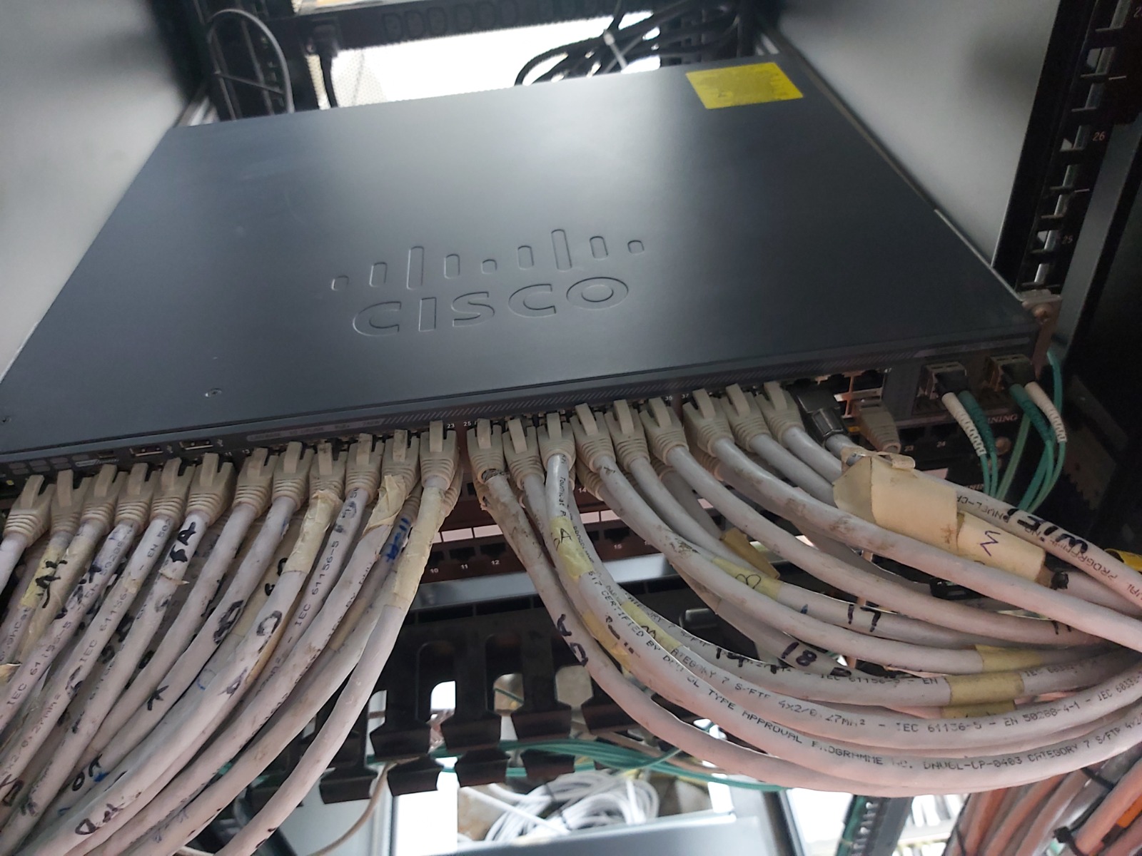 Cisco network switch installed with connected vessel network cables