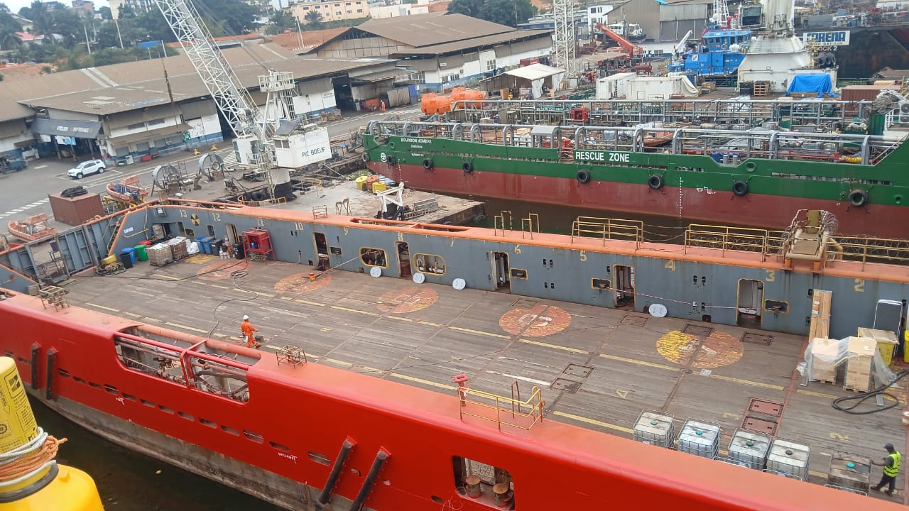 Marine vessel deck and satellite communications equipment